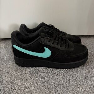 Black Sneakers with Teal Swoosh